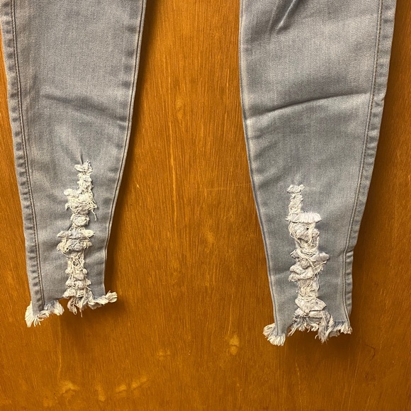 Stretchy High Rise Ripped Jeans in Light Blue - Picture 4 of 7